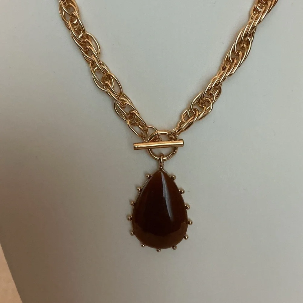 Brown Teardrop Gold Tone Pendant this necklace